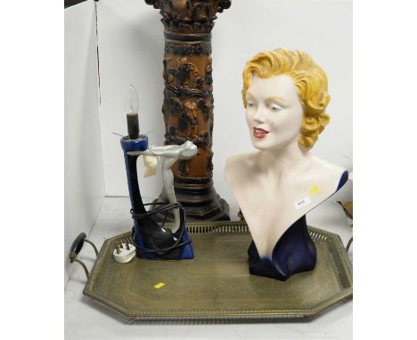 A bust of Marilyn Monroe, on tapered blue base, approximately 52cms high; together with an Art Deco style figural table lamp;