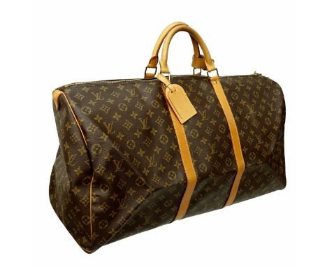 Louis Vuitton Brown Canvas Monogram Keepall 60 Travel Bag. Golden brass hardware, brown interior, vachetta handles. Luggage T