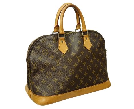 Louis Vuitton Brown Canvas Monogram Alma PM. Golden brass hardware, brown interior with slot and patch pockets, vachetta hand