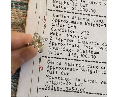 Approx. 3.0 Carat Marquise Cut Diamond and Platinum Engagement Ring with Tapered Baguette Diamond Accents. Diamond L-M color,