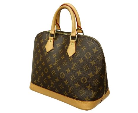 Louis Vuitton Brown Canvas Monogram Alma PM. Golden brass hardware, brown interior with slot and patch pockets, vachetta hand