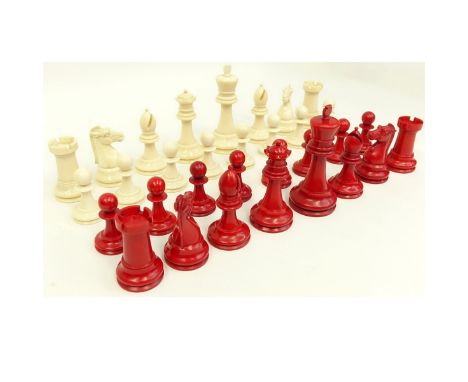 19th Century Staunton Ivory 32 Piece Chess Set. Wood box included. Natural and stained red pieces. Unsigned. King measures 4-