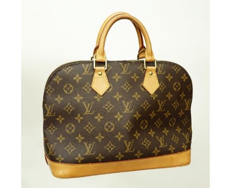Louis Vuitton Brown Canvas Monogram Alma PM. Golden brass hardware, brown interior with slot and patch pockets, vachetta hand
