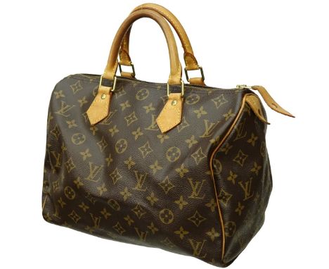 Louis Vuitton Brown Canvas Monogram Speedy 30 Bag. Golden brass hardware, brown interior with slot pocket, vachetta handles. 