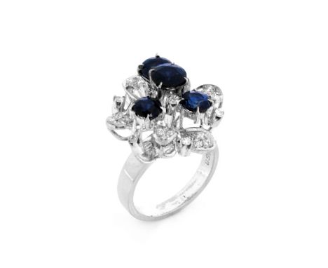Vintage Approx. 2.90 Carat Round Brilliant Cut Sapphire, .25 Carat Diamond and 18 Karat White Gold Cluster Ring. Sapphires wi