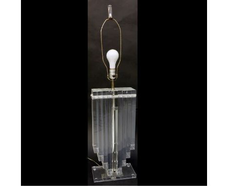Mid Century Modern Lucite Lamp. Unsigned. Measures 21" to top of Lucite x 10" W x 5" D. Condition: Good condition. Domestic S