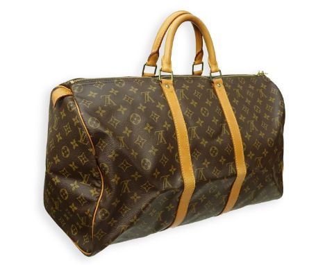 Louis Vuitton Brown Canvas Monogram Keepall 50 Travel Bag. Golden brass hardware, brown interior. Labeled appropriately. Seri