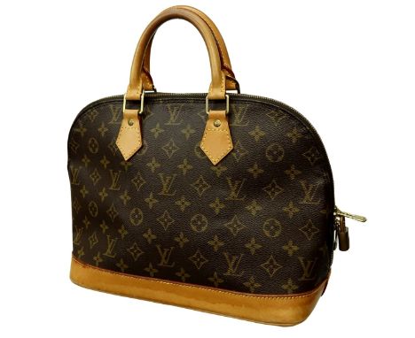 Louis Vuitton Brown Canvas Monogram Alma PM. Golden brass hardware, brown interior with slot and patch pockets, vachetta hand