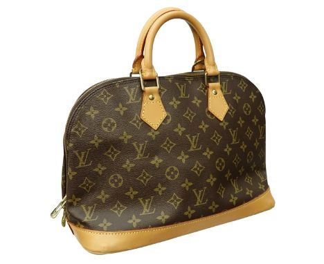 Louis Vuitton Brown Canvas Monogram Alma PM. Golden brass hardware, brown interior with slot and patch pockets, vachetta hand