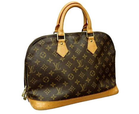 Louis Vuitton Brown Canvas Monogram Alma PM. Golden brass hardware, brown interior with slot and patch pockets, vachetta hand