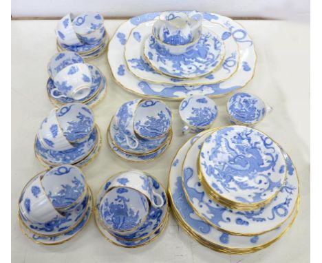 A ROYAL WORCESTER BLUE DRAGON PATTERN DINNER SERVICE, LARGEST DISH 42CM W, PRINTED MARK