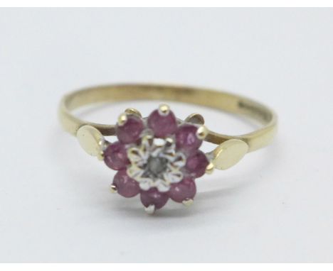 A 9ct gold, ruby and diamond cluster ring, 1.3g, N 