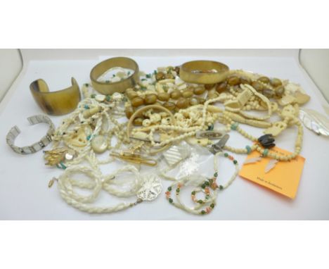 A collection of jewellery including bone and mother of pearl 