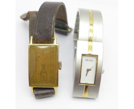 A lady's Gucci wristwatch and a gentleman's rectangular cased wristwatch with manual wind movement, 19mm case 