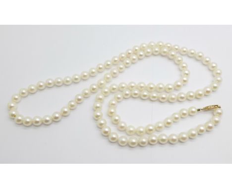 A cultured pearl necklace with 14k gold clasp 