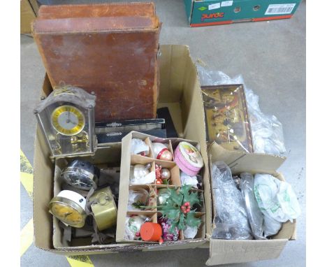 Flatware, a cuckoo clock, other clocks, tins, Christmas decorations, etc. **PLEASE NOTE THIS LOT IS NOT ELIGIBLE FOR POSTING 