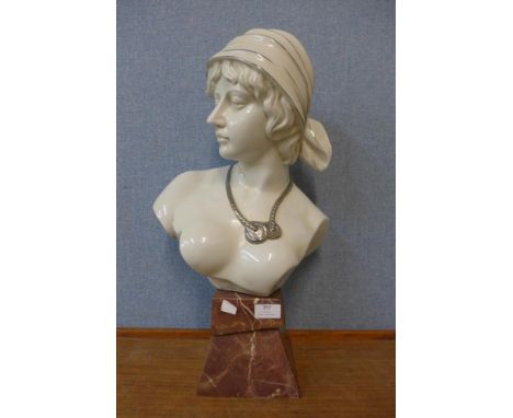 A ceramic bust of a lady