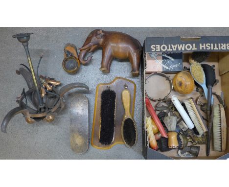 Clothes brushes, a carved wooden elephant, light fitting, etc. 