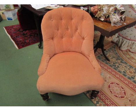 A circa 1860 walnut button back armchair in peach upholstery the serpentine front seat on turned legs and brass cup 'cope &am