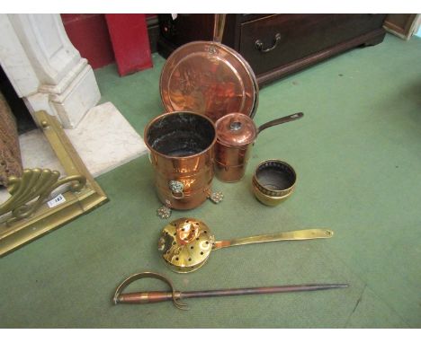 A selection of copper wares including bed warmer, chestnut roaster, sword form fire poker and planter with lion paw feet (6)