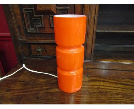 An orange glass table lamp, 27cm tall