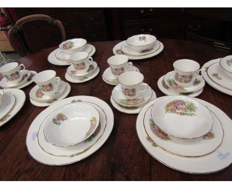 A Queen Anne tea service, white ground with timber framed cottage design