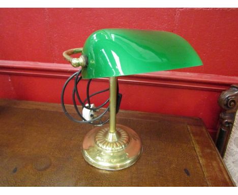 A green glass bankers lamp