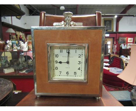 An alloy and leather cased timepiece mantel clock, Wellington Square Oxford, 38cm tall