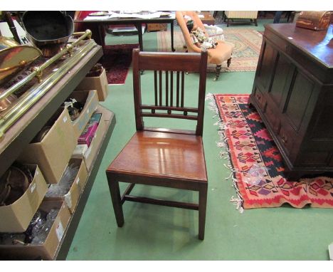A set of four East Anglian circa 1820 square back fruitwood chairs with button decoration and flat seats on tapering square l