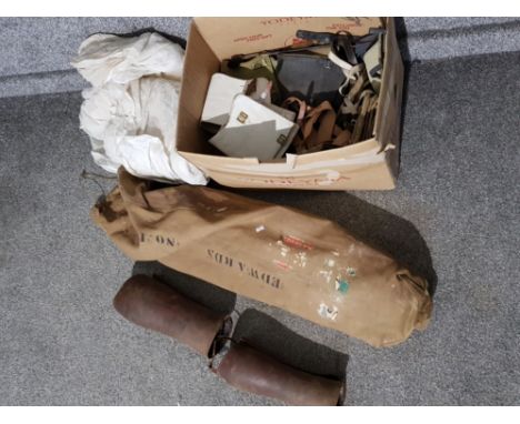 British Army canvas camp bed and bag, webbing belts, packs, two mosquito nets, gaiters etc