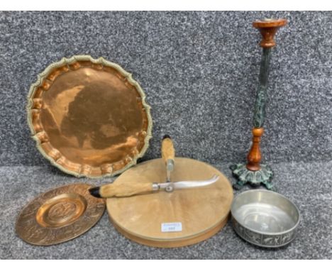 A cheese board with deer hoof handles, metal and wood candle stick, Norwegian pewter bowl etc