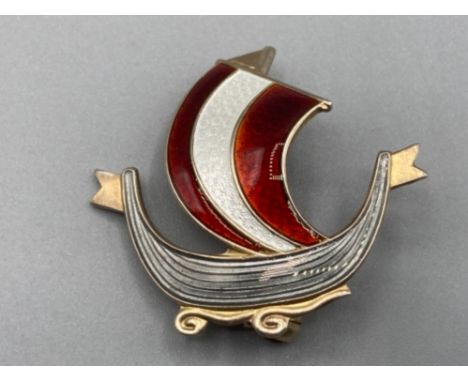 A Norwegian silver and enamel brooch in the form of a Viking ship by Askell Holmsen Sandefjord