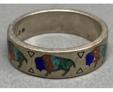 A silver and hardstone ring with buffalo designs size R 1/2 5.7g gross
