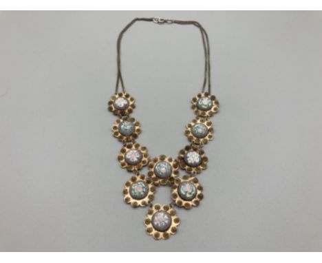 A white metal, silver and enamel necklace stamped 925 to clasp