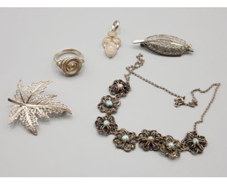 White metal jewellery comprising two brooches, a ring and a pendant together with a silver plated and turquoise necklace