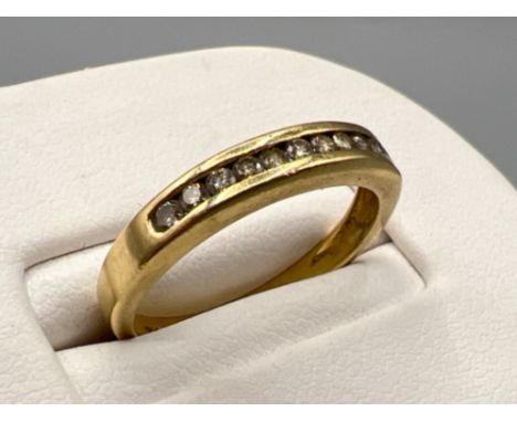 18ct gold diamond half eternity ring. Comprising of 11 round cut diamonds, 2.8g size O