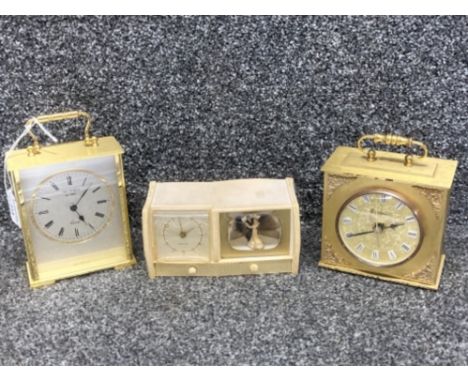 Two carriage clocks and an alarm clock