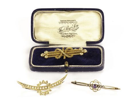 A Victorian gold clove hitch rope brooch, together with a seed pearl set sun and moon brooch, and an amethyst and seed pearl 