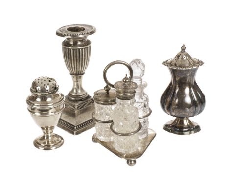 A silver filled dwarf candlestick, together with a silver plated and cut glass cruet set a silver plated pepperette and a pou