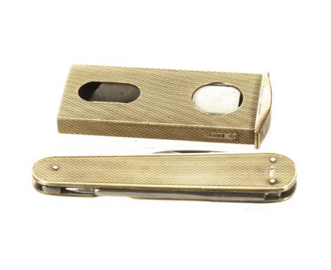 A 9ct gold pocket knife and cigar cutter, the Asprey & Co pen knife with engine turned panels and having two blades and a pic
