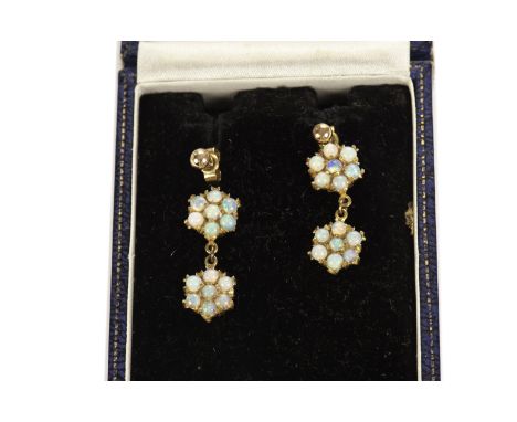 A pair of opal earrings, having two clusters of opals in yellow metal, one AF, in vintage retailers box (3)