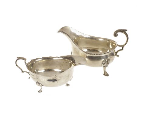 A George V silver sauce boat, of heavy gauge and marked Sheffield 1920 by Harrison Brothers and Howson, plus a smaller later 