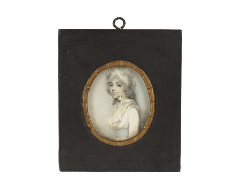 A George III watercolour on ivory portrait miniature, depicting a young lady in an empire line dress and headscarf c.1815, in