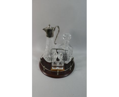 A Galleried Mahogany Tray Containing Silver Plated Topped Claret Jug, Hexagonal Spirit Decanter and Oil and Vinegar Bottles 