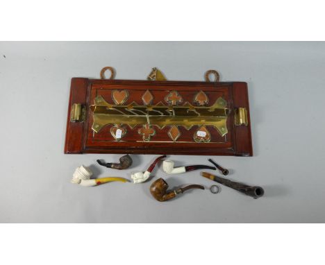 A Late 19th Century Brass and Copper Mounted Oak Wall Hanging Pipe Rack with Horse and Horse Shoe Decoration Together with a 