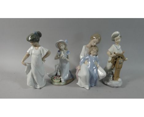 A Collection of Four Spanish Nao Figural Ornaments 