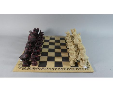 A Novelty Resin Chess Set with Pieces in the Form of Birds, Playing Board 39cm Square 