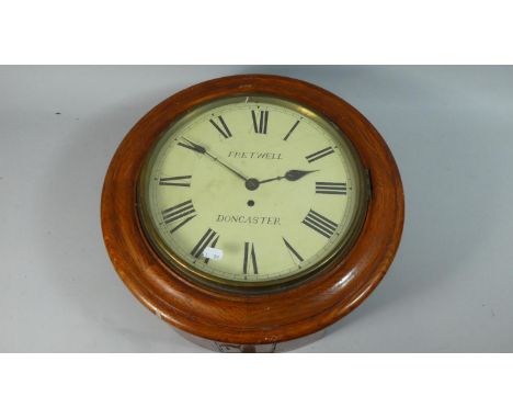 A Reproduction Circular Oak Framed Wall Clock the Dial Inscribed Fretwell, Doncaster, Pendulum Requires Attention to Leaf, 42