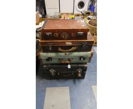 A Collection of Four Various Vintage Suitcases 