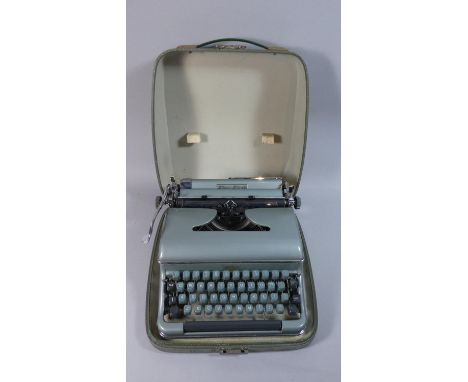 A Vintage Blue Bird West German Manual Typewriter 